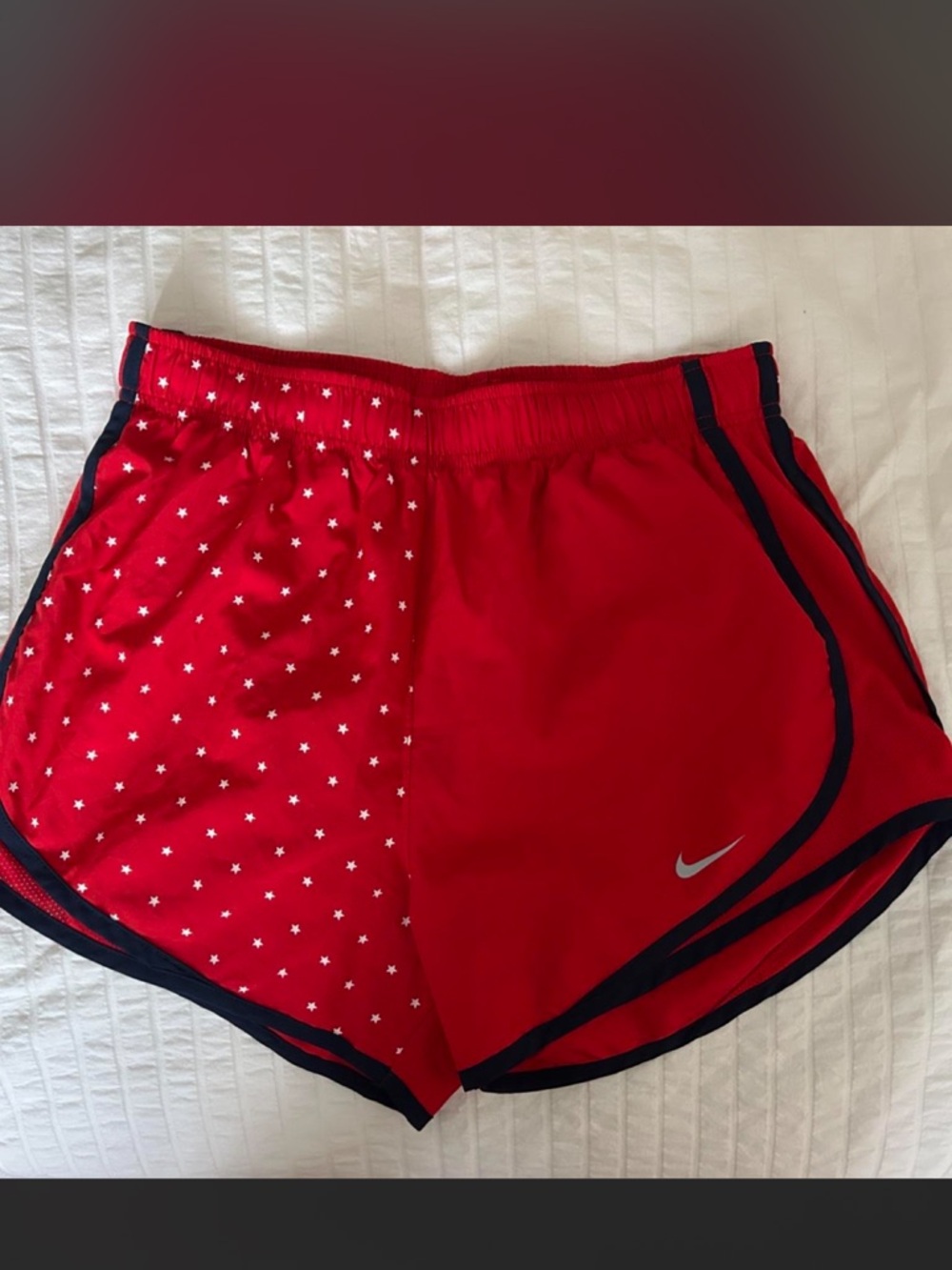 Nike Women's Red Athletic Shorts with Star Panel and Navy Trim